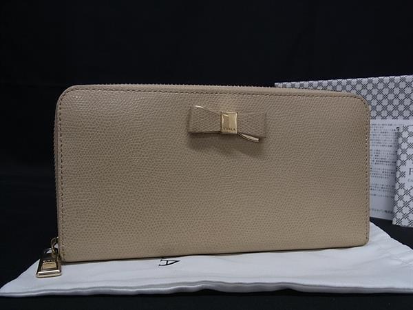 ■美品■ FURLA フルラ レザー リボン ラウンドファスナー 長財布 ウォレット 札入れ 小銭入れ カード入れ アイボリー系 DJ8291
