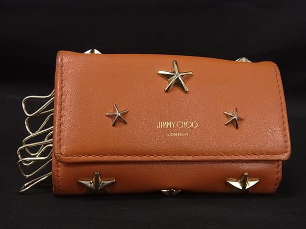 JIMMY CHOO ジミーチュウ ネプチューン レザー スタースタッズ 6連 キーケース 鍵入れ レディース オレンジ系 DM4271