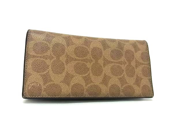 COACH コーチ 74939 シグネチャー PVC 二つ折り 長財布 ウォレット 小銭入れ 札入れ カード入れ レディース メンズ ブラウン系 DK9135