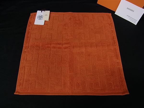 ■新品■未使用■ HERMES エルメス ステアーズ コットン 100％ ハンドタオル フェイスタオル メンズ レディース オレンジ系 FU5341