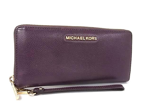 商品情報 ブランド名 MICHAEL KORS マイケルコース 状態ランク Bランク ライン カラーパープル系 素材 レザー サイズ(cm) W 約21cm　H 約9.8cm　D 約2cm サイズ(inch) W 約8.27inch　H 約3.86inch　D 約0.79inch ポケット中 ポケット×3　札入れ×3　小銭入れ×1　カード入れ×10以上 付属品画像内にあるものが全てになります シリアル及び刻印 状態使用感　擦れ　汚れメッキ剥げ □□□　状態ランクについて　□□□ 【N】　新品 【S】　未使用品（展示品など） 【A】　傷汚れが少なく状態の良い商品 【B】　程よい使用感や多少の傷、汚れはあるが程度良好の商品 【C】　使用感の他、目立つ傷や汚れが見れる商品 【D】　かなり大きな痛みがある難あり商品 ※記載させていただきました状態説明・ランクは、あくまで弊社基準にて判断したものとなります。 その為、個人差による主観の差が生じる場合も御座いますので、あらかじめご了承頂いた上で、ご検討下さいませ。 pleasure（株式会社peace）が販売しています。 出品中の商品につきましては全て正規品(本物）でございます。 （古物許可証第305521507463東京都公安委員会）