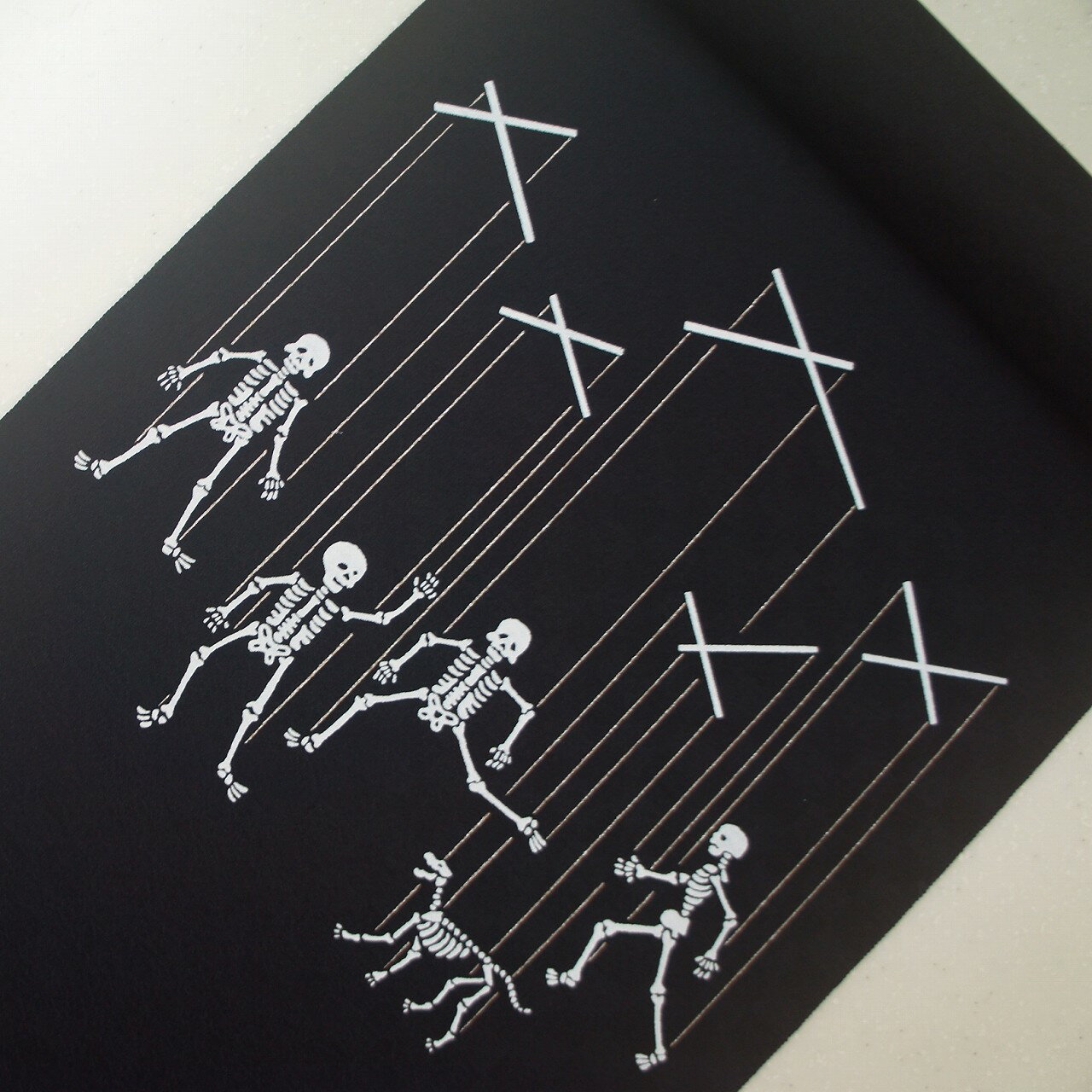 正絹紋意匠染帯 マリオネット柄 ガイコツ 染帯 黒地