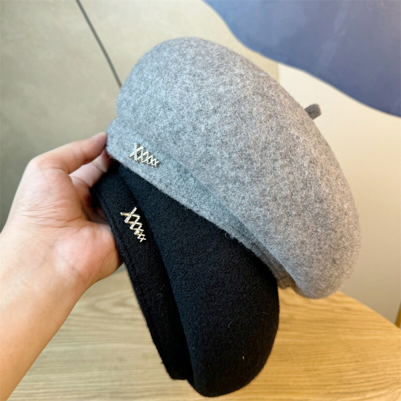 秋冬ベレー帽の子供2024新型毛は画家帽が顔の小さな文字に八角カボチャ帽をつけている