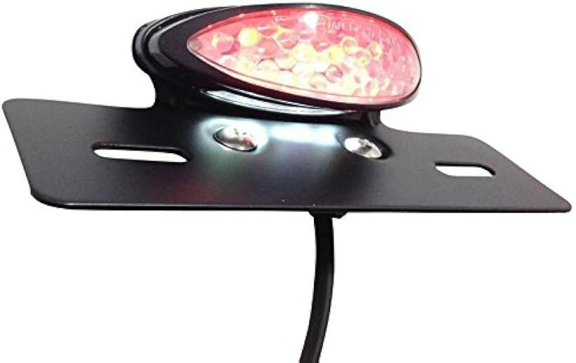 バリエーションコード : 2bbahjk0pi商品コード2bbd2bp6f7商品名互換品 nakira 強力発光。 汎用 LED テールランプ ブラック クリアレンズブランドナキラ(Nakira)カラーブラック　クリアレンズ12V汎用タイプレンズ：クリアナンバーステー付きテールランプ：赤LED14発 ナンバー灯：白LED5発黒線：アース線　赤線：ブレーキランプ線　黄線：スモールランプ線※ 他ネットショップでも併売しているため、ご注文後に在庫切れとなる場合があります。予めご了承ください。※ 品薄または希少等の理由により、参考価格よりも高い価格で販売されている場合があります。ご注文の際には必ず販売価格をご確認ください。※ 沖縄県、離島または一部地域の場合、別途送料の負担をお願いする場合があります。予めご了承ください。※ お使いのモニタにより写真の色が実際の商品の色と異なる場合や、イメージに差異が生じることがあります。予めご了承ください。※ 商品の詳細（カラー・数量・サイズ 等）については、ページ内の商品説明をご確認のうえ、ご注文ください。※ モバイル版・スマホ版ページでは、お使いの端末によっては一部の情報が表示されないことがあります。すべての記載情報をご確認するには、PC版ページをご覧ください。＊テールランプ　LED　スリム型　汎用　ナンバーステー付き汎用テールランプなので、様々なバイクに取付可能です。デザインも楕円で多くの車種に似合います。＊サイズランプ部高さ：約29mm　幅：約100mmナンバーステー縦：約48mm　幅：約172mmケーブル長約280mmステー取付サイズ幅：約45mm＊その他オリジナルパッケージ商品です。
